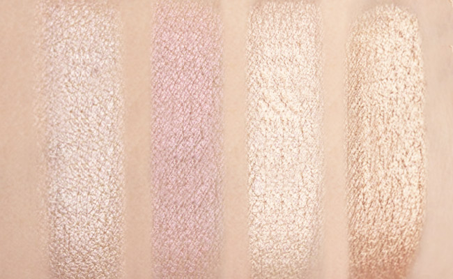 Swatches of Huda Beauty Glow Obsessions Highlighter Palette in Light